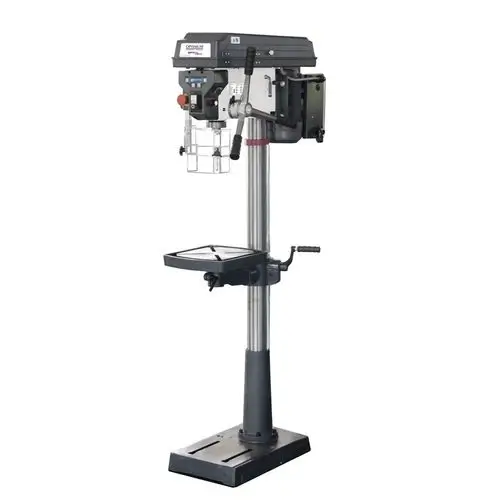 Masina industriala de gaurit cu coloana inalta si baza solida, dotata cu ecran de protectie reglabil pentru aschii si maner ergonomic cu trei brate pentru avansul pinolei. asina de gaurit cu coloana Optimum verticala pentru ateliere mecanice.
